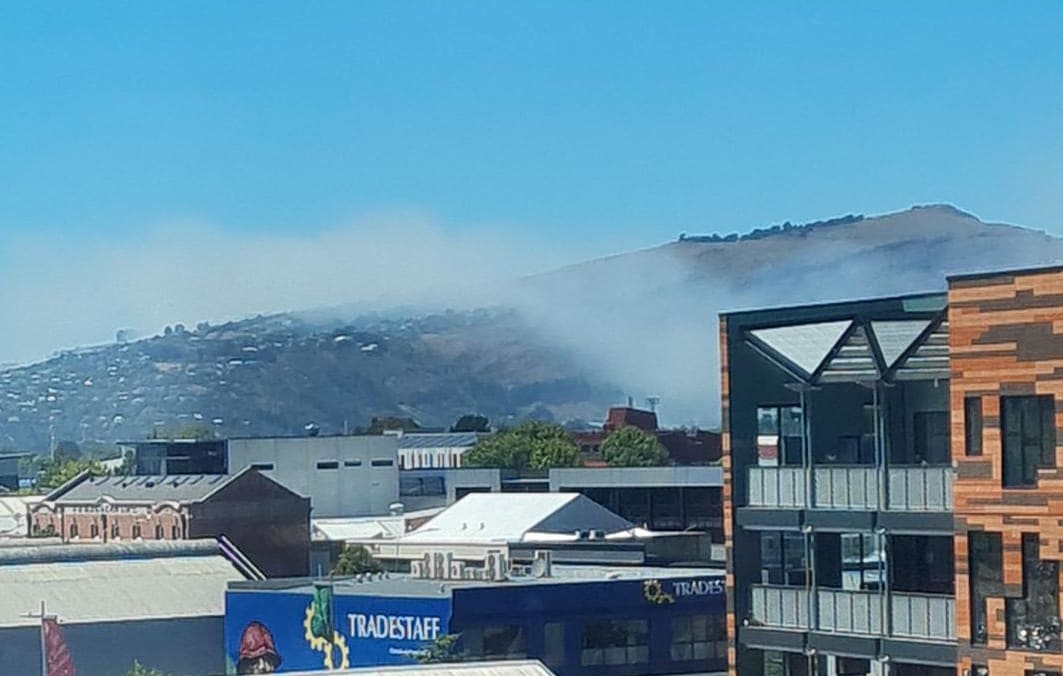 Smoke can be seen coming from the fire.