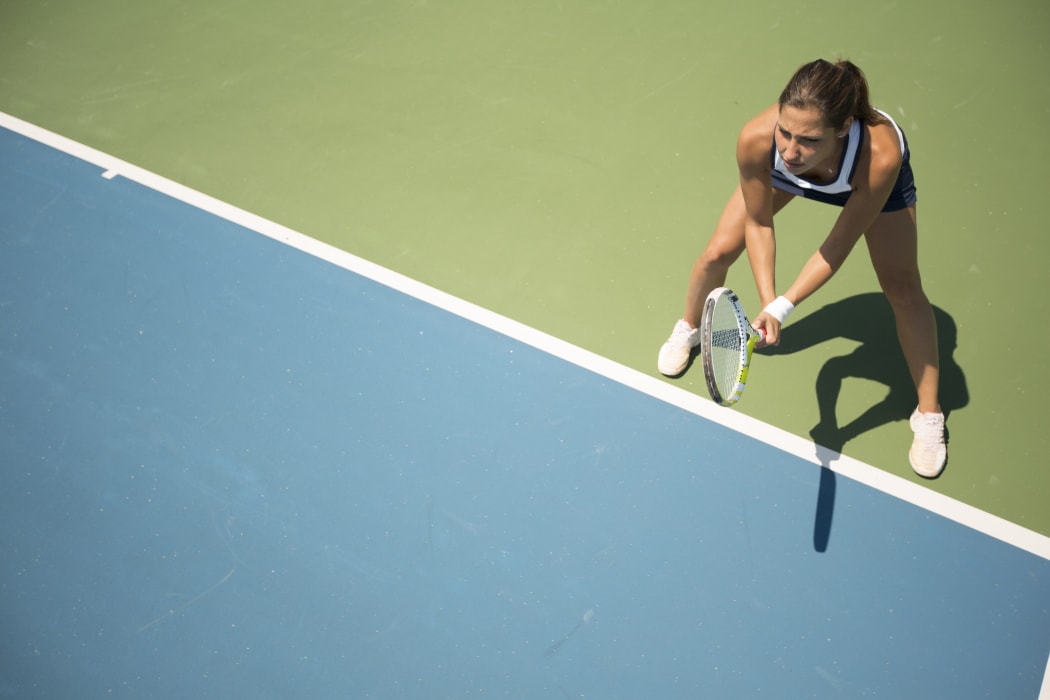 Young woman playing tennis