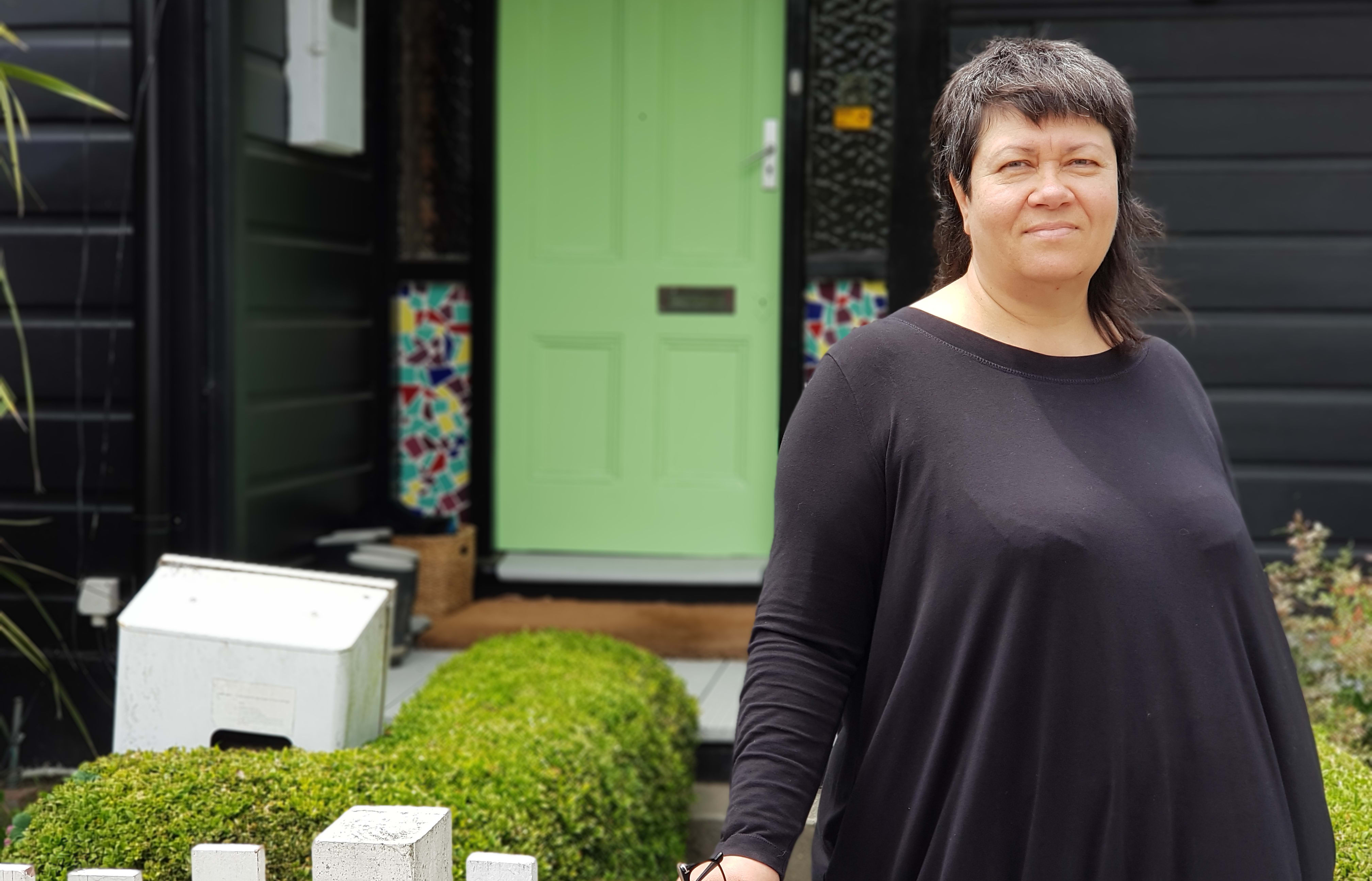 Rose Miller outside her home at Wright Street.