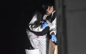 A Turkish forensic police officer searches for evidence at the Saudi Arabian consulate on October 17, 2018 in Istanbul.