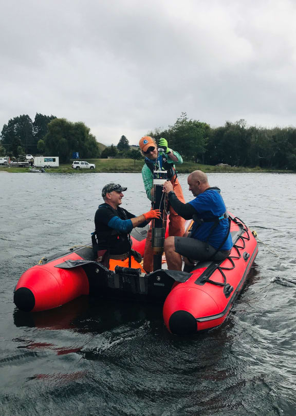 Collecting lake samples for 'Lakes 380 - Our lakes' health - past, present, future' project.