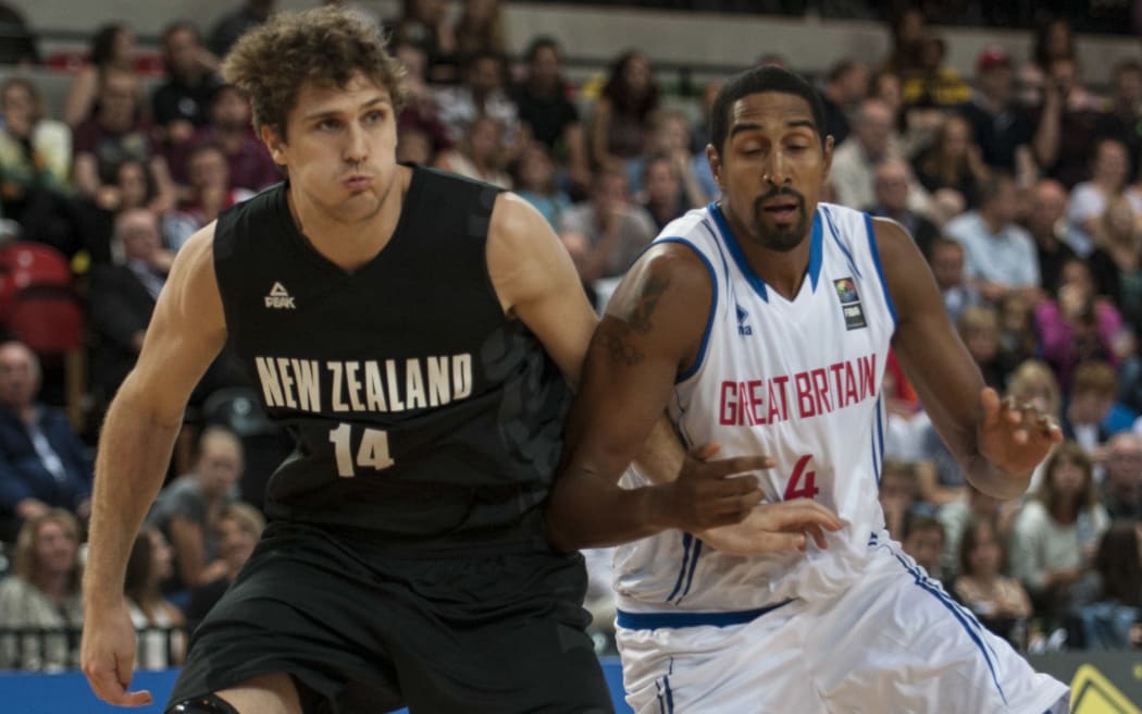 Tall Blacks centre Robert Loe in action against Kieron Achara