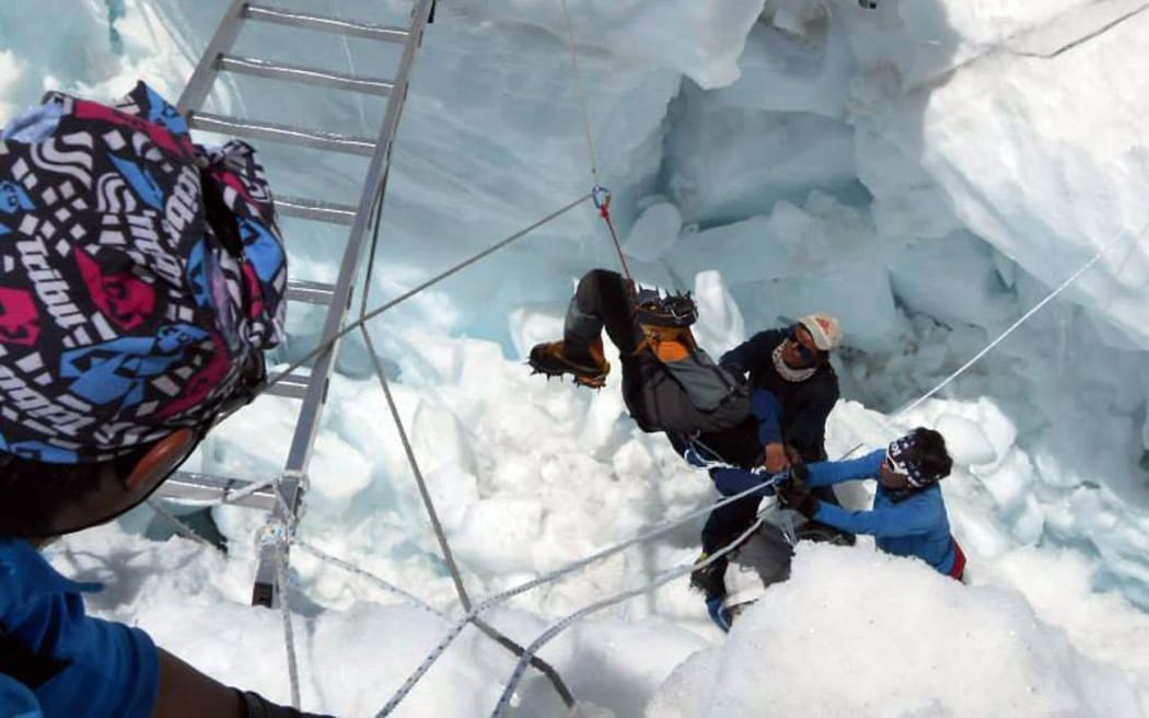 The rescue of a Sherpa after the Everest avalanche on Friday.