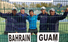 Guam's promotion hopes were dealt a blow with defeat against Bahrain.
