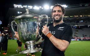 All Blacks captain Sam Whitelock holds the Bledisloe Cup after beating the Wallabies in the 2nd 2021 Bledisloe Cup Test rugby match at Eden Park - Auckland - New Zealand.  14  August  2021.