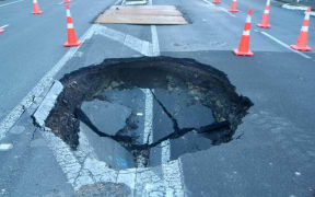 A large sinkhole has opened up on College Hill Road in central Auckland, around the corner from the Auckland Police Station.