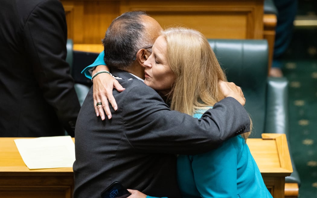 Former Speaker and Labour MP Adrian Rurawhe hugs National Party Minister Louise Upston after his valedictory speech. When he represented Te Tai Hauāuru their electorates overlapped.