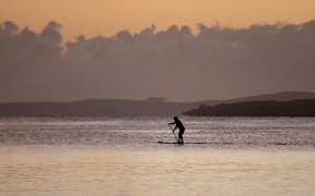 Auckland's Takapuna Beach on the morning of 26 March, on the first day of the nationwide Covid-19 lockdown.