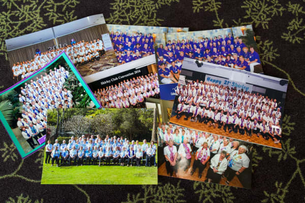 A collection of printed photos showing the Shirley Conventions all around the world.
