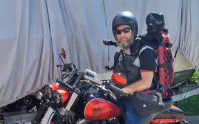 Stevin Creeggan and his dog Loki