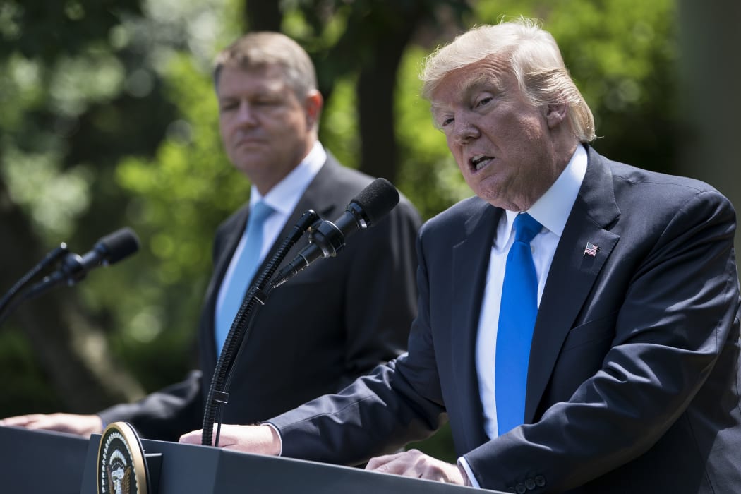 US President Donald Trump at a media conference in the Rose Garden of the White House with the visiting  president of Romania Klaus Iohannis.