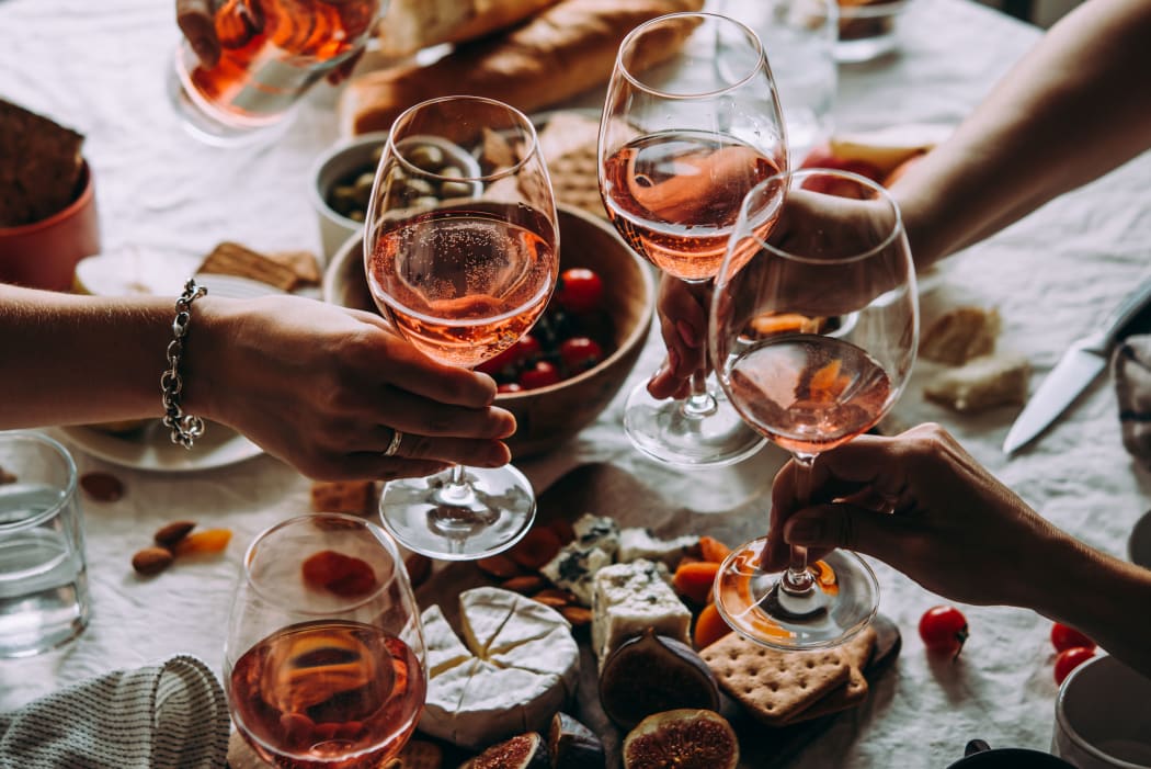 Glasses of rose wine seen during a friendly party of a celebration.