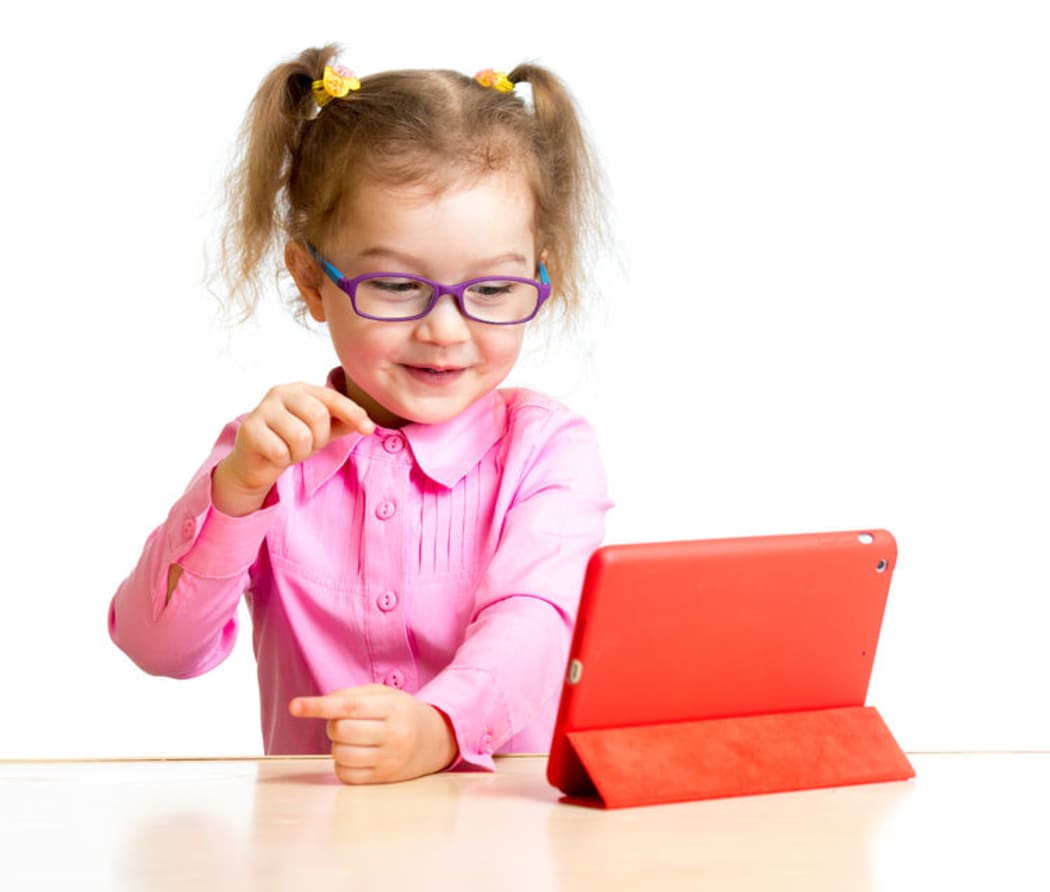 child in glasses