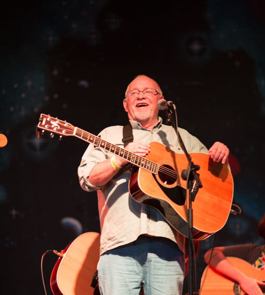 Eric Bogle on stage in 2014