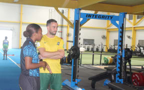 ‘Kurukuru’ national Futsal team Head Coach Damon Shaw and SINIS High Performance Manager (PM) for Portfolio Two (Team Sports) Amanda Korinihona touring SINIS.