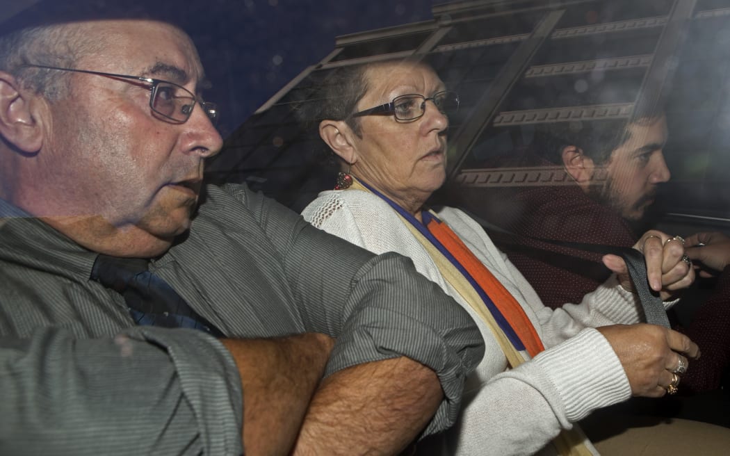 Mark Lundy's sister Caryl Jones, centre, and her family being driven away from the High Court after the verdict.