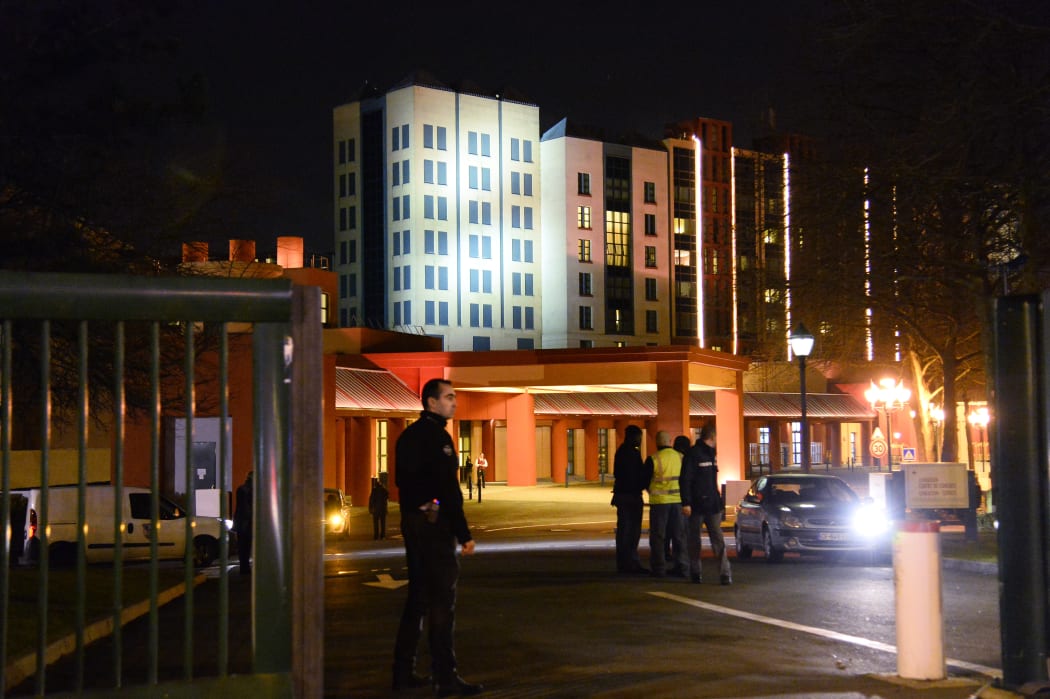 Police stand guard at the Dinseyland hotel where a man was arrested.