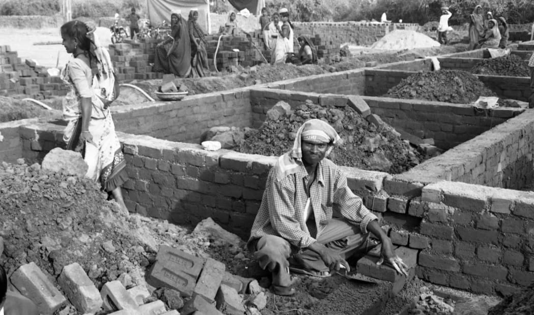 Building a new village for the dispossessed after the Gujarat Massacres.