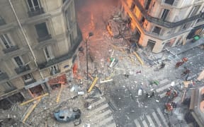 Debris and car wreckage following the explosion of a bakery in central Paris.