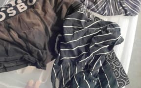 Three pairs of dirty, used and torn underwear donated to South Auckland charity - The Aunties, which supports victims of domestic violence.