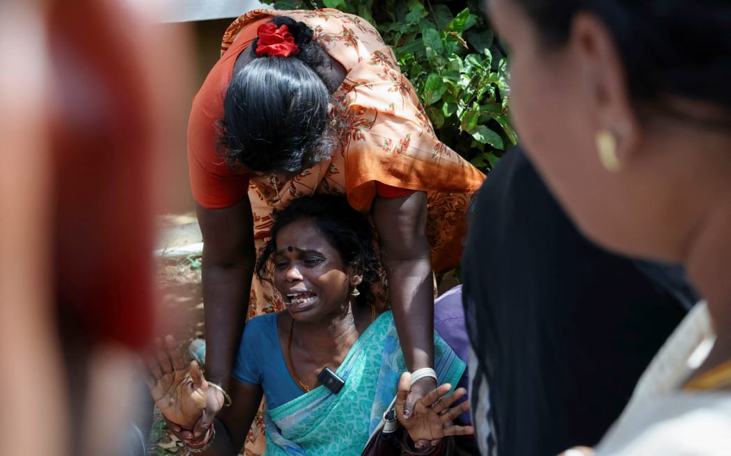 A victim's relative grieves in front of Karur Government Medical College hospital following a crowd crush at a campaign rally held by Tamilaga Vettri Kazhagam party, in Karur district of Tamil Nadu, India on September 28.
Mandatory Credit:	Priyanshu Singh/Reuters via CNN Newsource