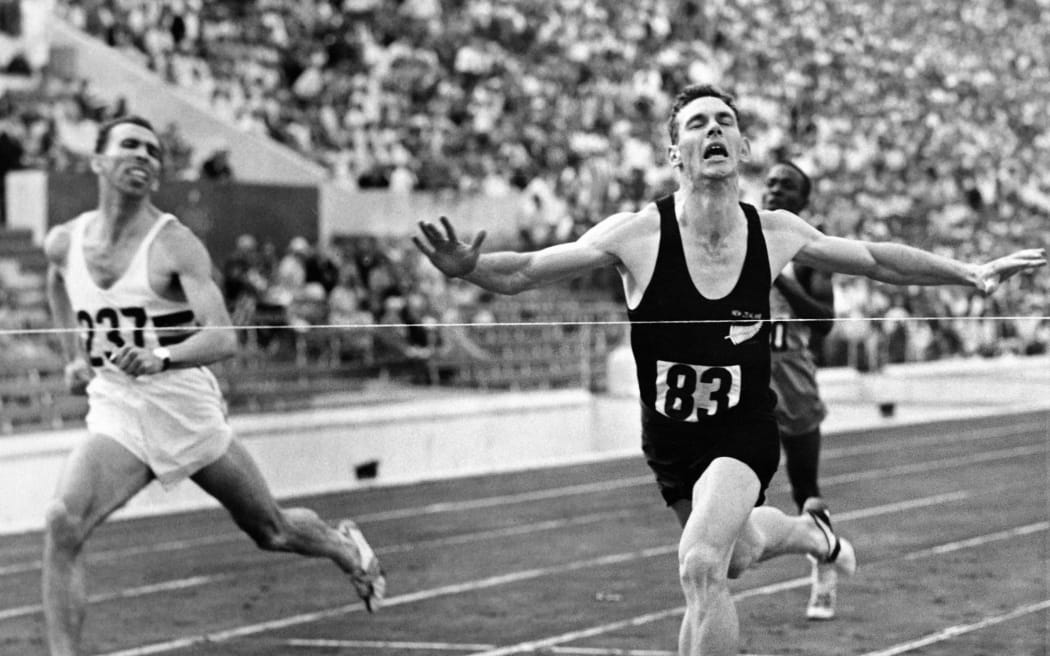 Peter Snell sprints to win the 800m final in front of Roger Moens from Belgium on 2 September 1960 during the Olympic Games in Rome.