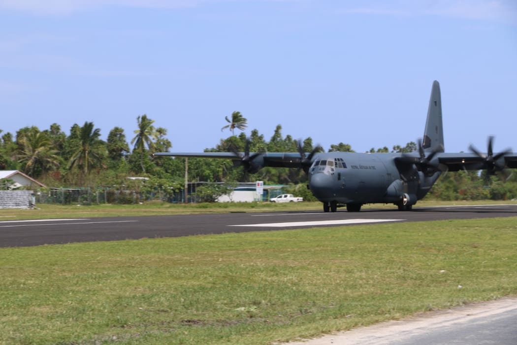 A Hercules aircraft arrives in Funafuti, Tuvalu.