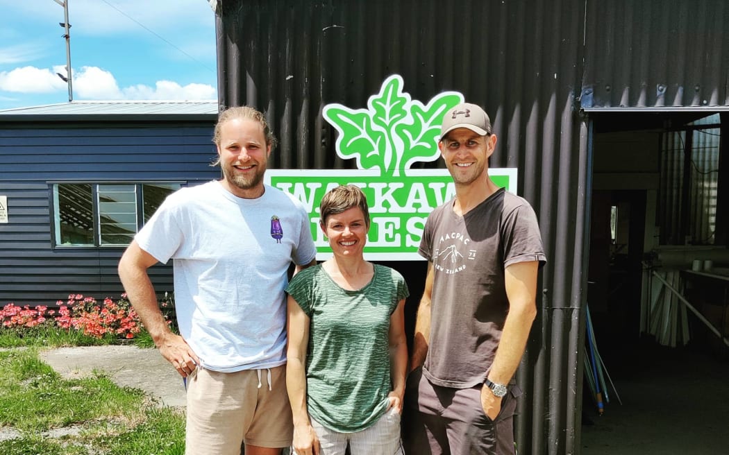 Angus Simms with Lisa and Tony Dale-Low from Waikawa Fresh