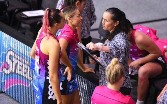 Steel coach Reinga Bloxham talks to her players.