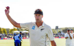 Kyle Jamieson of the Black Caps leaves the field with the match ball after getting a 5 wicket bag against India, 2020.