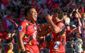 Ioane Moananu and Levi Aumua of the Crusaders celebrate.