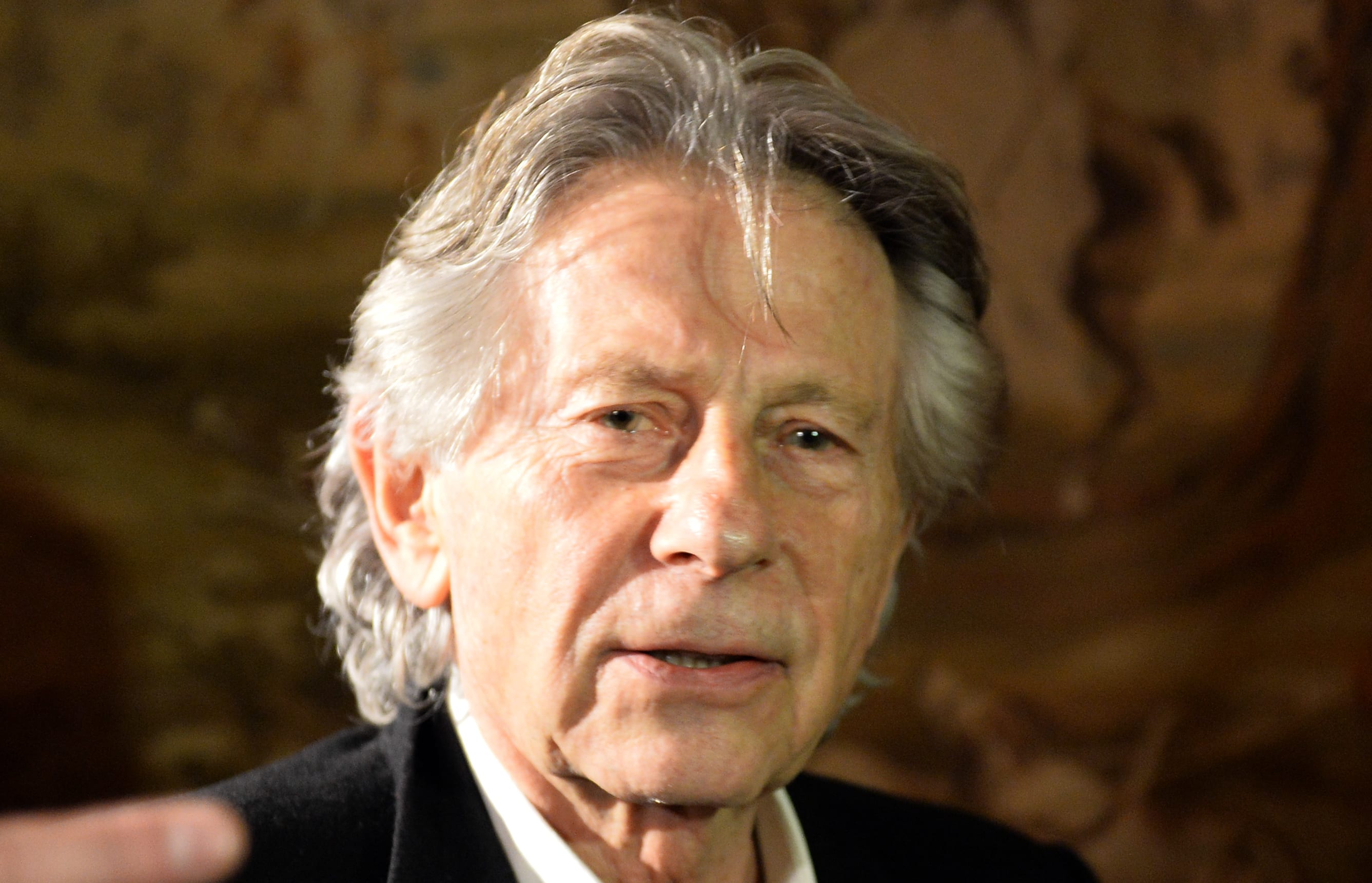 Oscar-winning director Roman Polanski arrives for a press conference after his trial at the regional court in Krakow