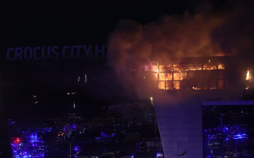 A view shows the burning Crocus City Hall concert hall following the shooting incident in Krasnogorsk, outside Moscow, on March 22, 2024.