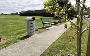 The two benches face away from Randwick Park, which is located near a school.  LDR SINGLE USE ONLY