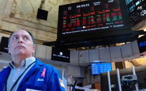 NEW YORK, NEW YORK - APRIL 01: Traders work on the floor of the New York Stock Exchange during morning trading on April 01, 2025 in New York City. Stocks opened up low as the market reacts to tomorrow’s expected proposal by U.S. President Donald Trump for a round of new tariffs on most imports to the United States, which the president has dubbed “Liberation Day.” China, Japan, and South Korea have agreed to respond to U.S. tariffs jointly.   Michael M. Santiago/Getty Images/AFP (Photo by Michael M. Santiago / GETTY IMAGES NORTH AMERICA / Getty Images via AFP)
