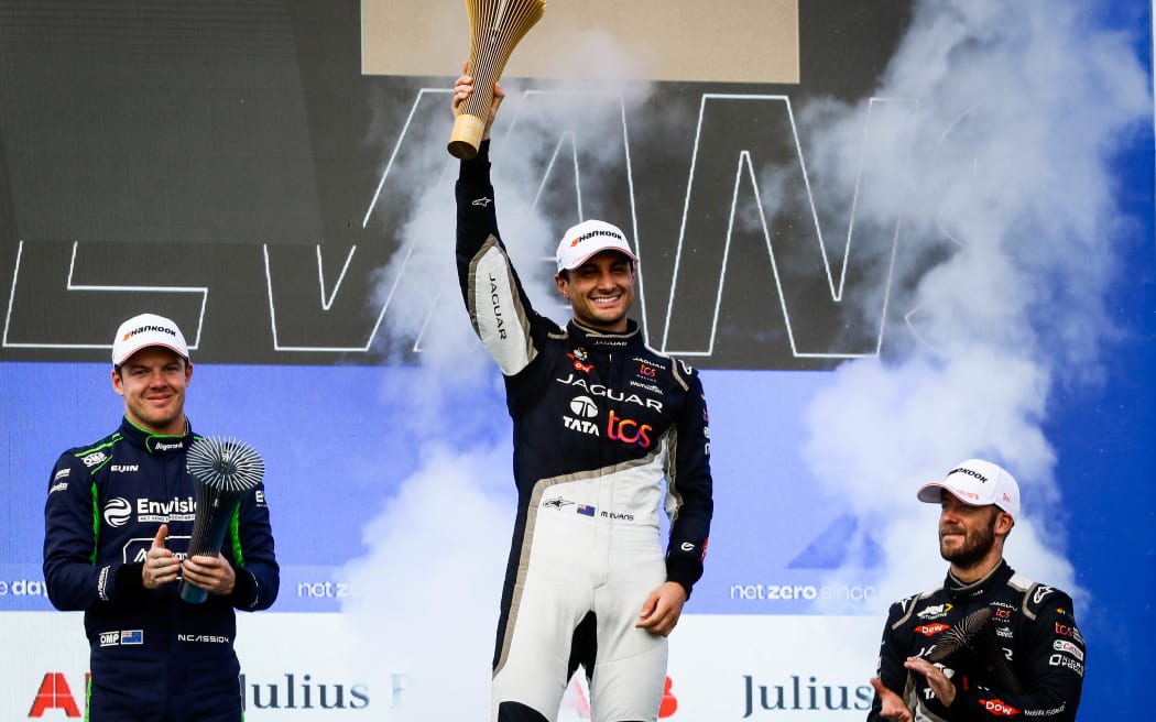 New Zealand drivers Mitch Evans (C) and Nick Cassidy (L) on the podium after the Sao Paulo E-Prix.