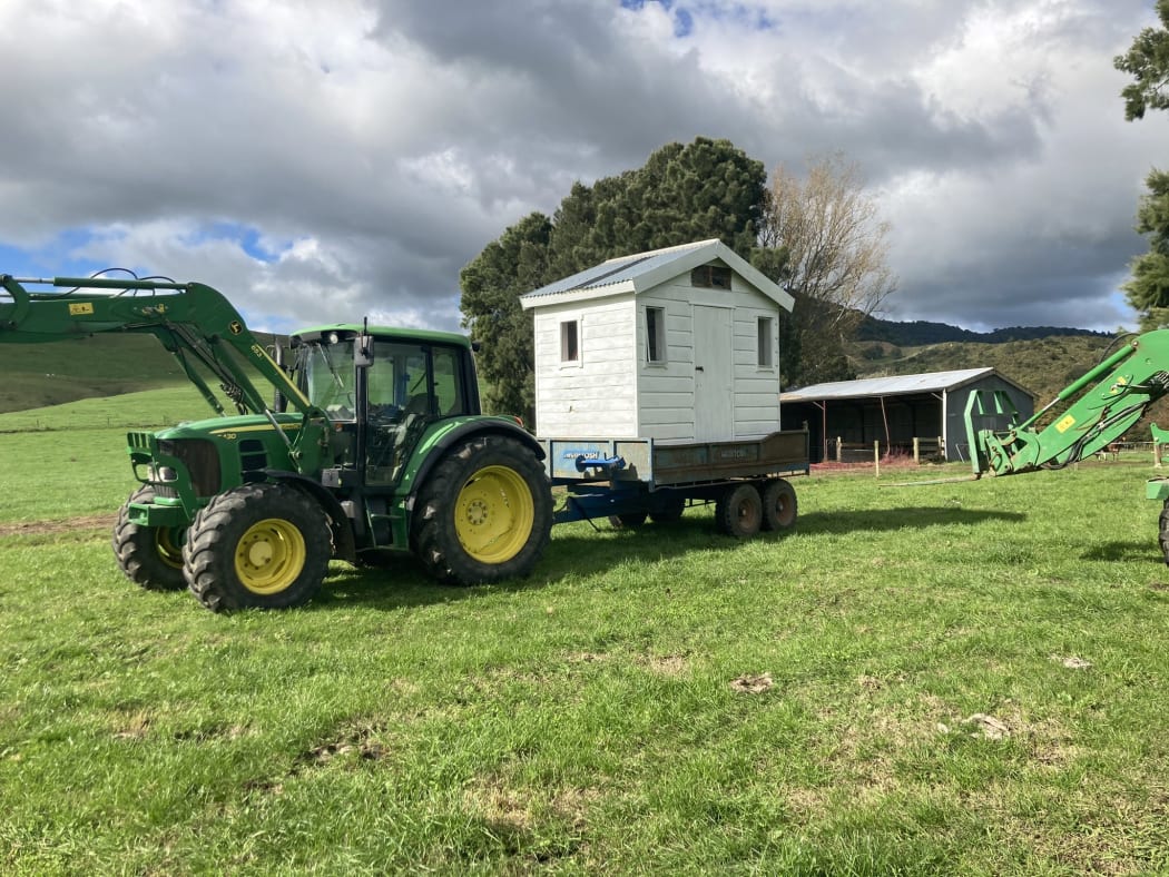 Paeroa farmer Bart Van de Ven moving has also had to move his daughters' playhouse.