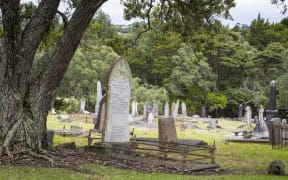 An image of a grave in a cemetery