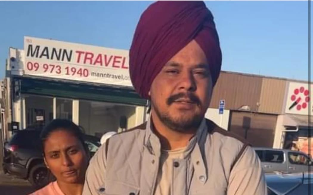 Gagandeep Singh with his wife Parneet Kaur in front of Mann Travel office in Auckland.