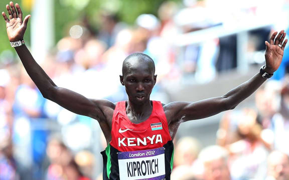Wilson Kipsang Kiprotich of Kenya Celebrates after finishing.