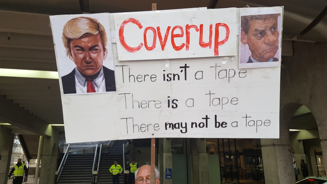 A protest sign references Bill English's handling of Todd Barclay's employment dispute.