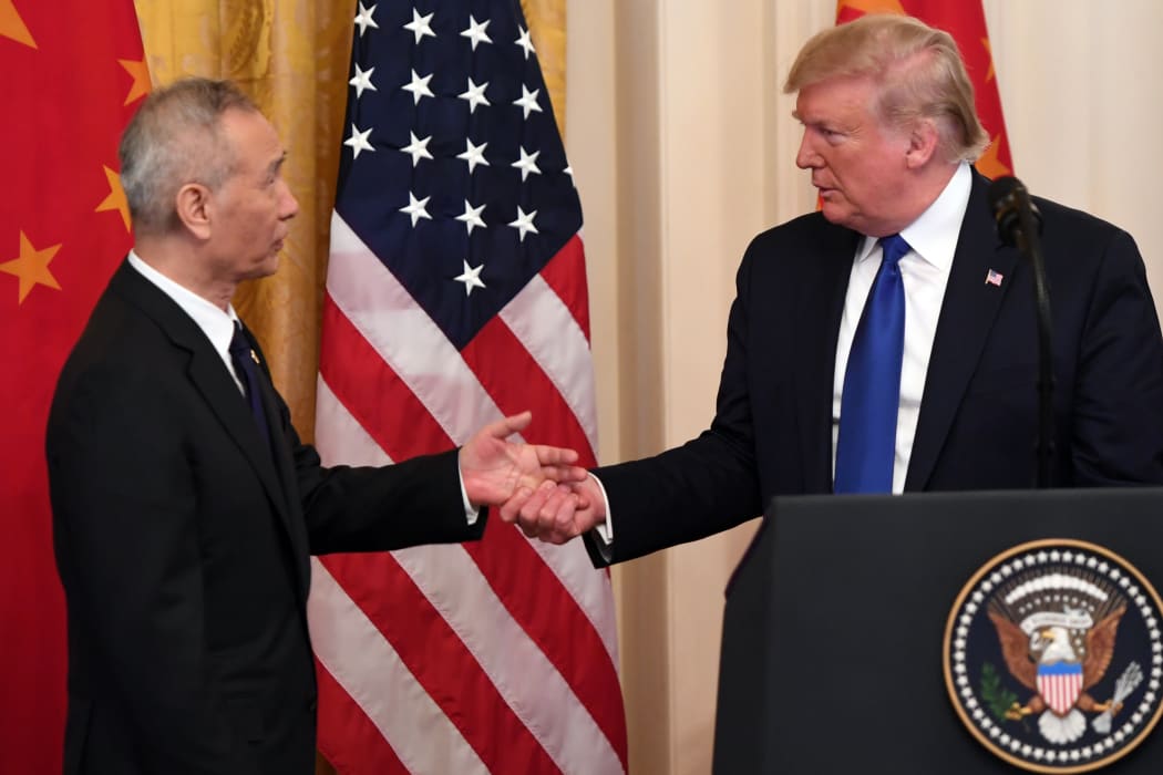 US President Donald Trump, shakes hands during a press conference with Chinas Vice Premier Liu He(L), the countrys top trade negotiator.