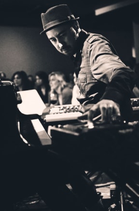 Japanese-Kiwi DJ and musician Mark de Clive-Lowe found a sense of belonging in Auckland's 1990s live music scene.