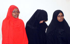 Three women brought before a court in Kenya's coastal city of Mombasa on March 30, 2015 after having been arrested by security forces at the border with Somalia for allegedly planning to travel to Syria. Yassin Juma / Anadolu Agency