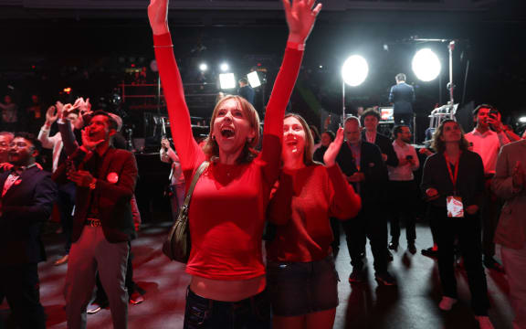 Supporters for Canada's Prime Minister and Liberal Party leader Mark Carney celebrate as results are announced during an election party in Ottawa.