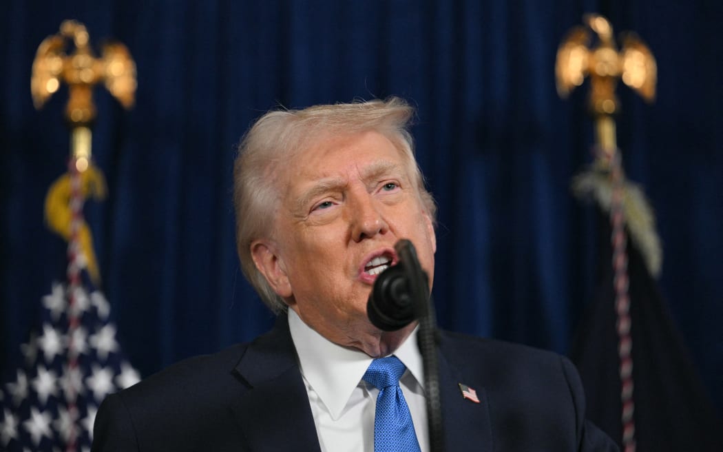 US President Donald Trump speaks to the press following US military actions in Venezuela, at his Mar-a-Lago residence in Palm Beach, Florida, on January 3, 2026. President Trump said Saturday that US forces had captured Venezuelan leader Nicolas Maduro after launching a "large scale strike" on the South American country. (Photo by Jim WATSON / AFP)