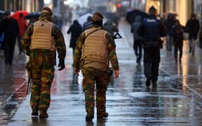 Police and military officers patrolling in central Brussels on Saturday.