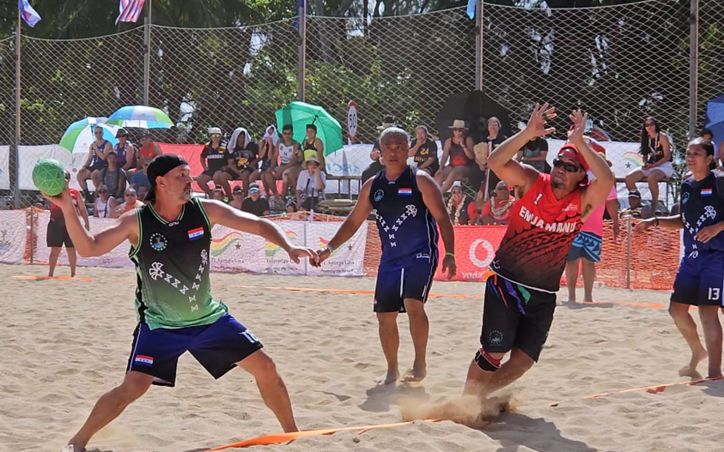 Rarotonga score against Enuamanu in the masters men beach handball.