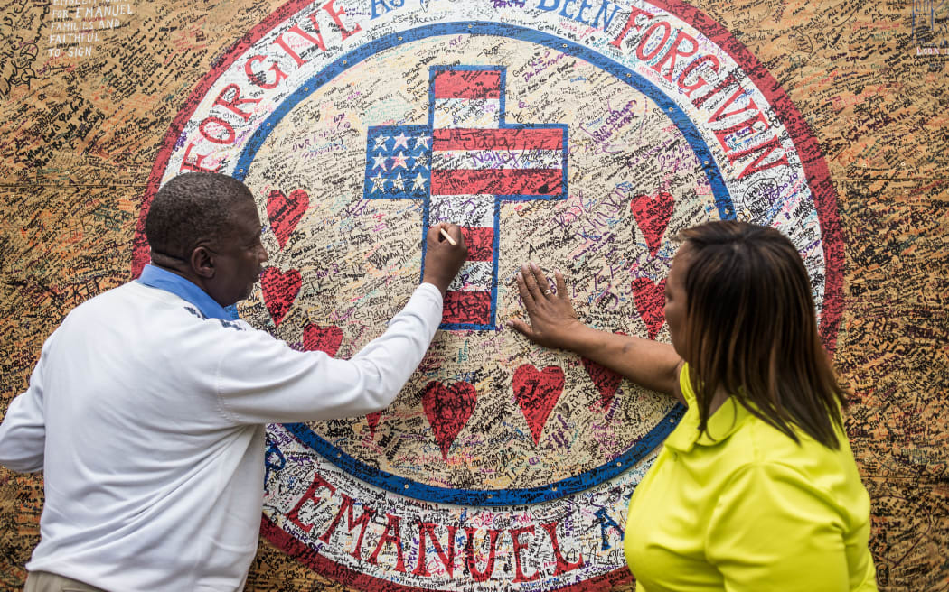 A memorial in front of Emanuel AME Church on July 31, 2015 in Charleston, on the day Dylann Roof was arraigned on 33 federal charges.