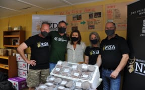 Members of the Nelson branch of the New Zealand Deerstalkers Association with Nelson Environment Centre CEO Anton Drazevic and Nelson Mayor Rachel Reese.